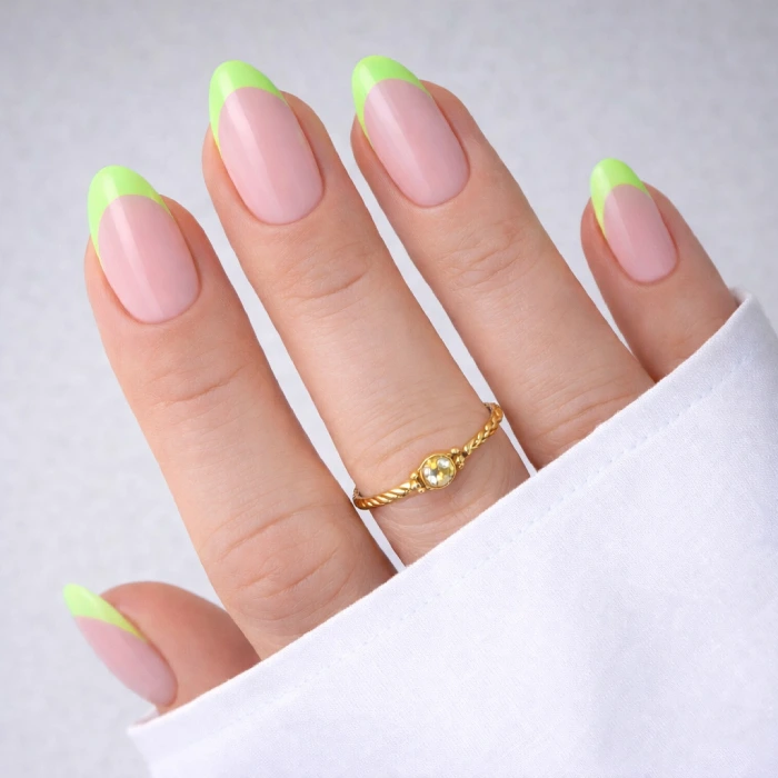 Lime green French tips on a pink base