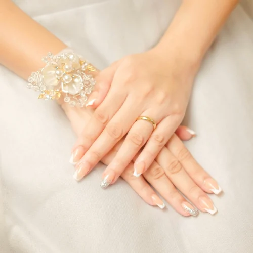 Bridal manicure with silver accents