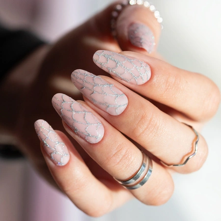 Long almond mermaid nails with a silver scale effect