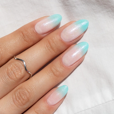 Almond ombré nails with turquoise tips