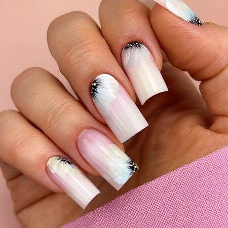 Spring milky nails with hand-painted pastel flowers