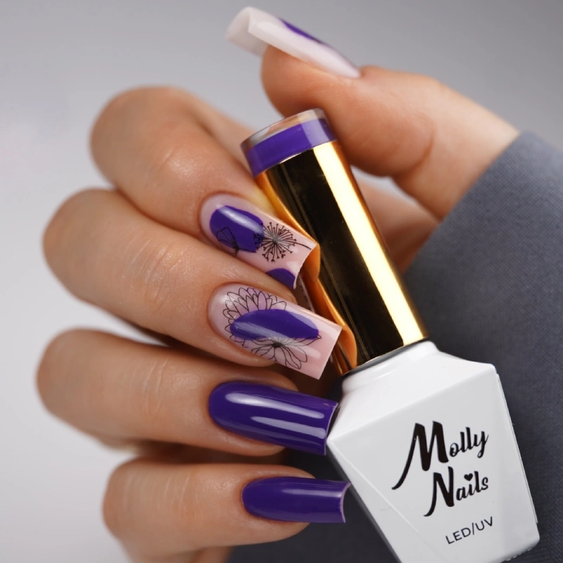 Purple nails with black floral outlines and a white Molly Nails gel polish bottle.