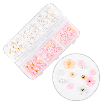 Caja con adornos de flores acrílicas de varios colores, unas 180 unidades